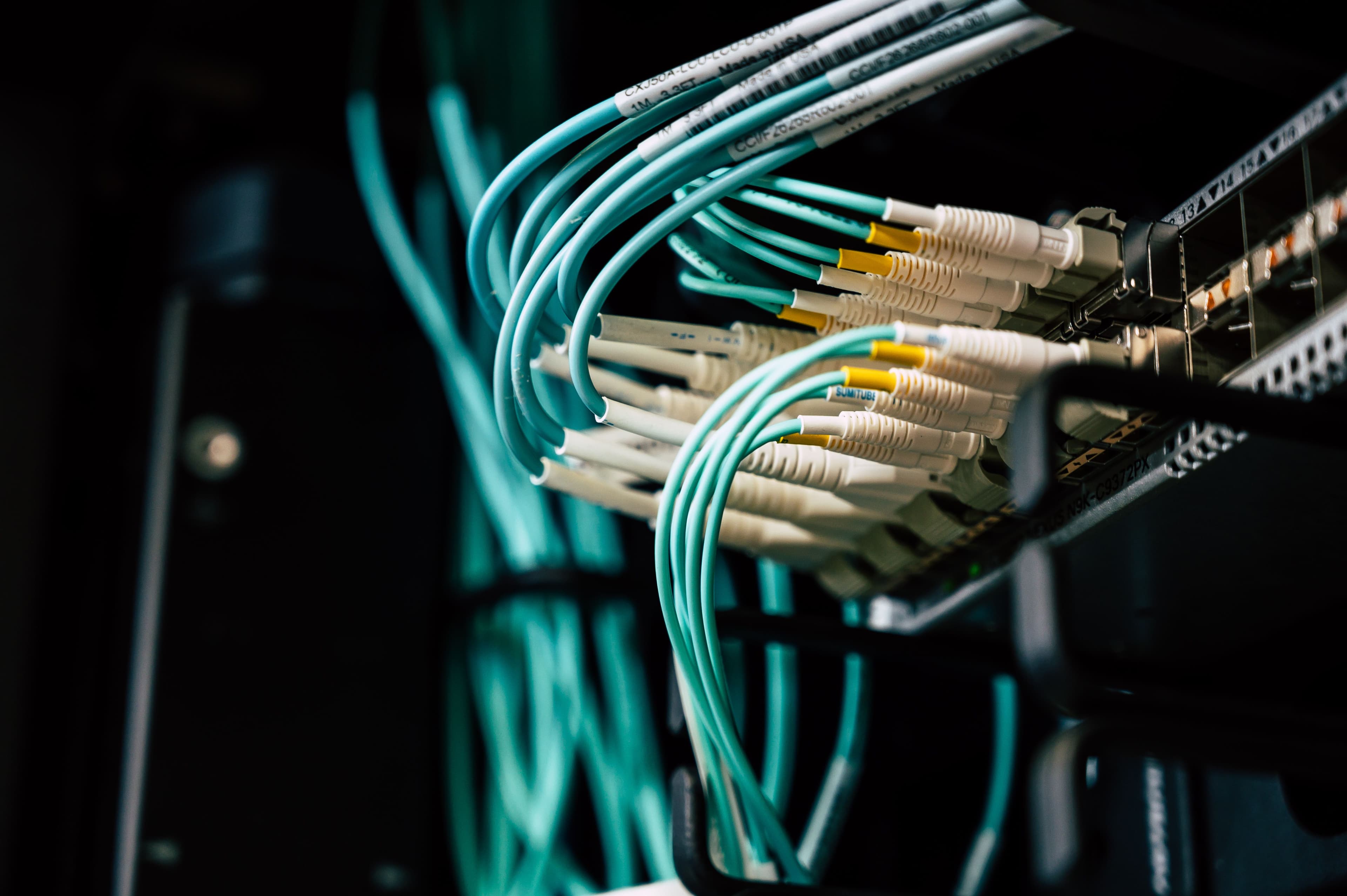 Fiber patch cables terminated into a switch in a network rack